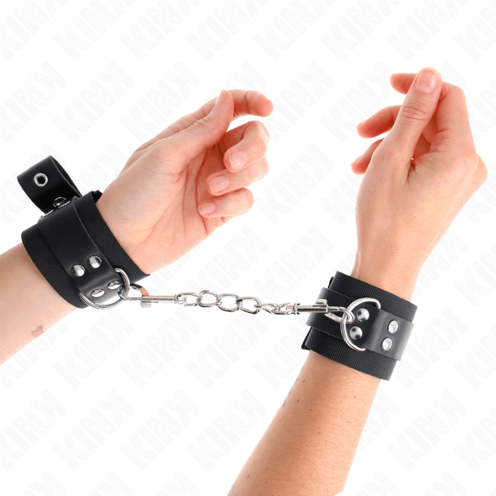 KINK - NYLON HANDGELENKFESSELN SCHWARZ MIT LEDERGURTE SCHWARZ VERSTELLBAR 19-29 CM - 5,1 CM - INTIM SPACE Online Sexshop