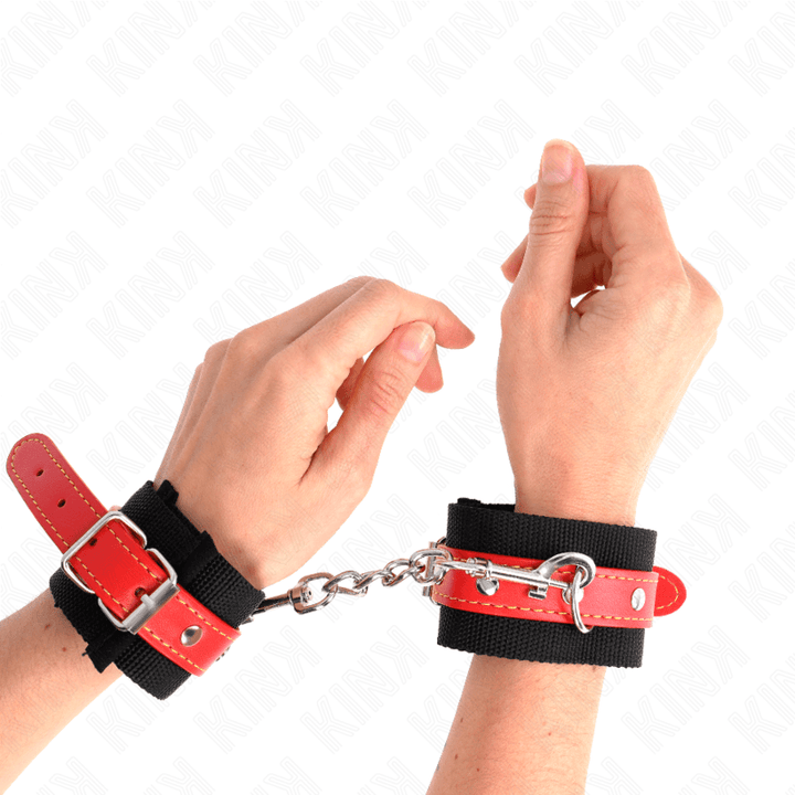 KINK - NYLON HANDGELENKFESSELN SCHWARZ MIT KUNSTLEDER ROT VERSTELLBAR 19-24 CM - 5,5 CM - INTIM SPACE Online Sexshop